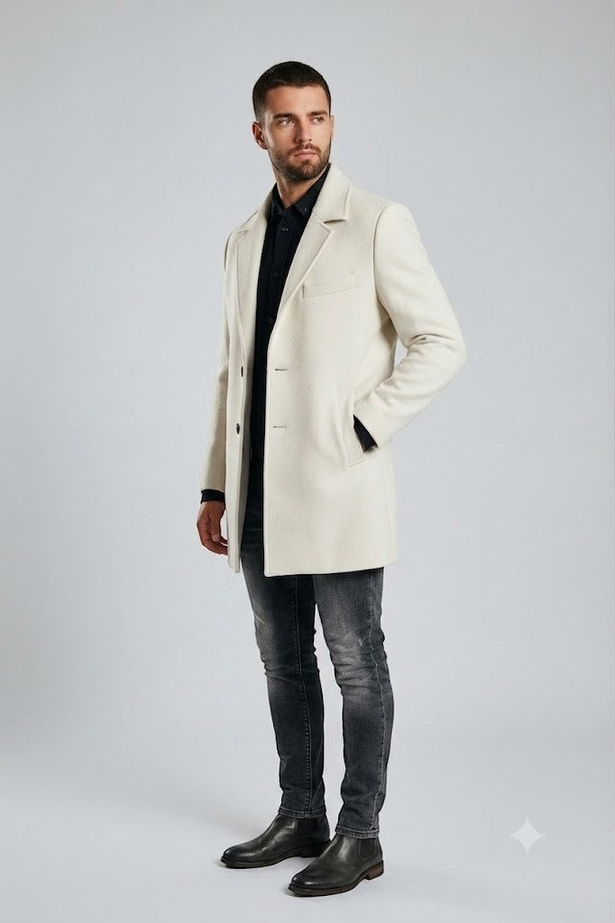 Scarlett Stitch men's cream wool-blend overcoat with notched lapel, three button closure, and side pockets.