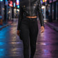 Scarlett Stitch black faux leather cropped moto jacket with diamond quilting and zippered cuffs.