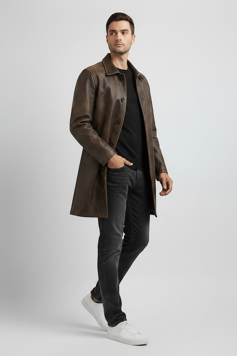 Scarlett Stitch men's distressed brown leather car coat with button closure and side pockets worn by a male model.