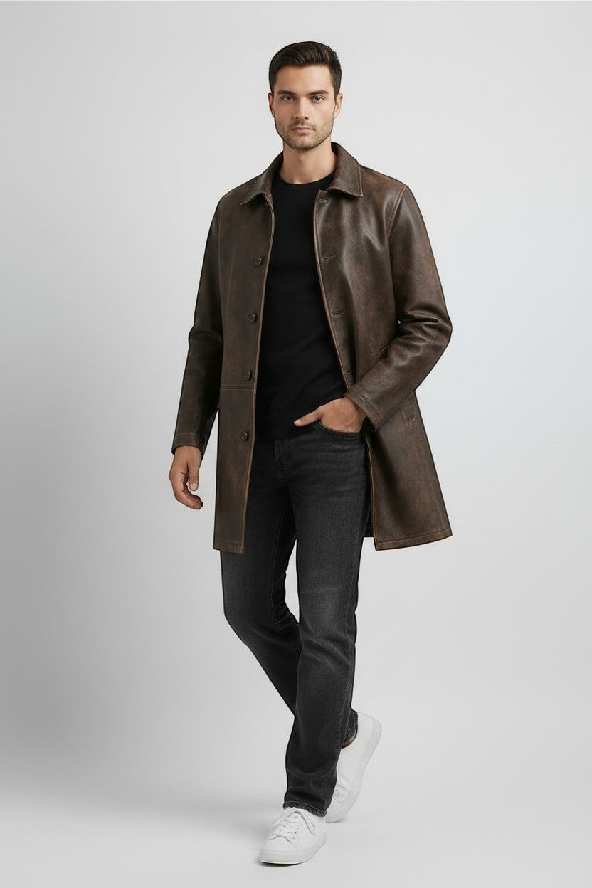 Scarlett Stitch men's distressed brown leather car coat with button front and structured collar on a male model.