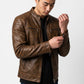 Scarlett Stitch men's distressed brown leather cafe racer jacket with quilted shoulders and zippered cuffs