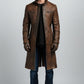 Scarlett Stitch men's distressed brown leather trench coat with high collar and zippered pockets on a male model.