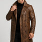 Scarlett Stitch men's distressed brown leather double-breasted trench coat with lapel collar worn by a model