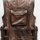 Scarlett Stitch brown distressed leather utility vest with multiple storage pockets and reinforced stitching.