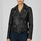Scarlett Stitch black faux leather moto jacket with embroidered floral back detail, notched lapels, and belt.