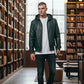 Scarlett Stitch forest green faux leather hooded bomber jacket with zip-front closure and ribbed cuffs.