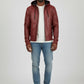 Scarlett Stitch men's hooded leather bomber jacket in burgundy with quilted shoulders and ribbed cuffs.