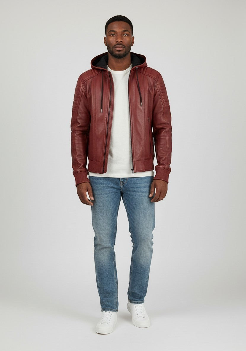 Scarlett Stitch men's hooded leather bomber jacket in burgundy with quilted shoulders and ribbed cuffs.