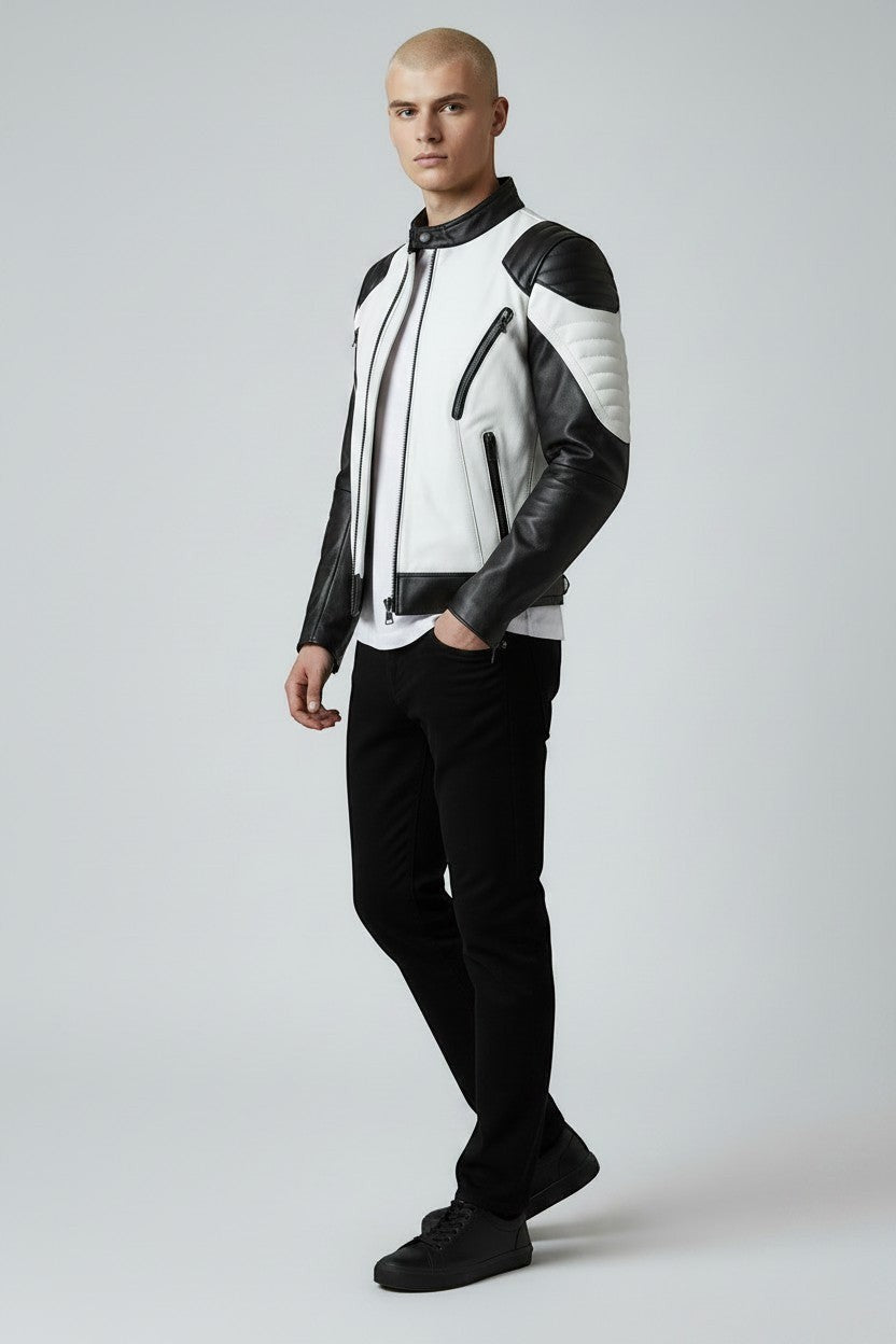 Scarlett Stitch men's black and white leather motorcycle jacket with quilted shoulder panels and zippered pockets.