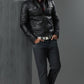 Scarlett Stitch Men's black faux leather moto jacket with snap collar, zip front, chest pockets, and epaulets.