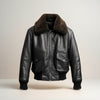 Scarlett Stitch Men's black faux leather bomber jacket with dark brown shearling collar, zip front, and flap pockets.