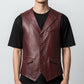 Scarlett Stitch men's burgundy leather vest with lapel collar, button front, flap pockets, and adjustable back belt.