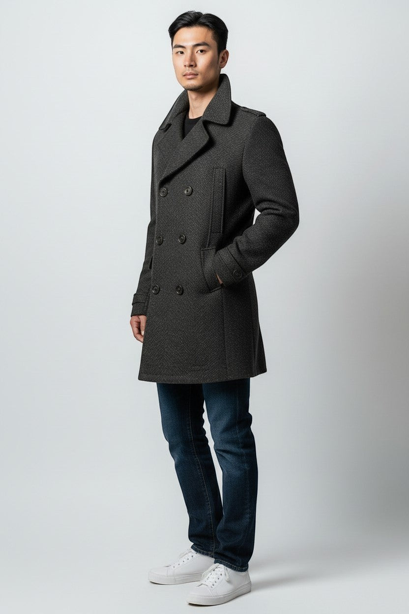 Scarlett Stitch Men's charcoal grey wool blend peacoat with herringbone weave, double-breasted closure, and epaulet details.