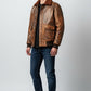 Scarlett Stitch Men's distressed brown faux leather bomber jacket with shearling collar, ribbed cuffs and hem, and flap pockets.