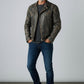 Scarlett Stitch Men's distressed black leather motorcycle jacket with zippered pockets and ribbed detailing.