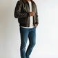 Scarlett Stitch Men's dark brown faux leather bomber jacket with shearling collar, zip-front, ribbed cuffs and flap pockets.