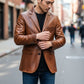 Scarlett Stitch Men's genuine leather blazer jacket in warm brown, featuring a notched lapel and button closure.