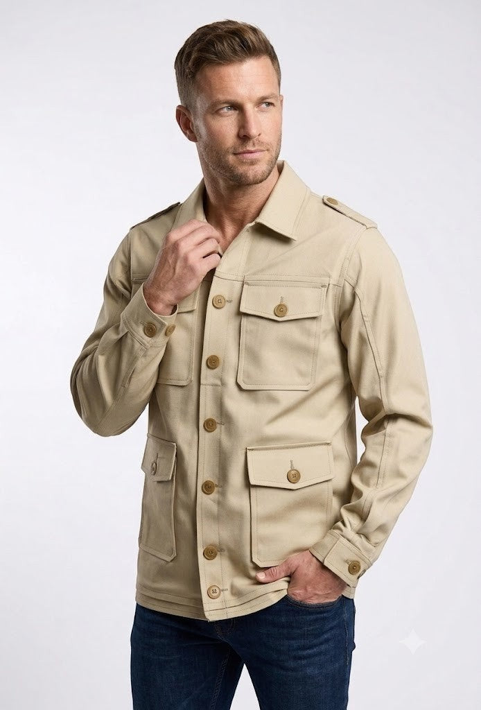 Scarlett Stitch Men's beige cotton blend safari utility jacket with multiple flap pockets and epaulets.