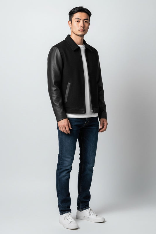 Scarlett Stitch Men's black wool bomber jacket with faux leather sleeves, zip front, and welt pockets.