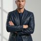 Scarlett Stitch Men's navy blue faux leather blazer jacket with silver stud accents on lapels and shoulders.