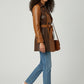 Scarlett Stitch brown and tan faux leather patchwork trench coat with self-tie belt and notched lapel.