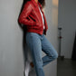 Scarlett Stitch women's red faux leather bomber jacket with ribbed collar, cuffs, and hem. Features flap chest pockets.