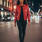 Scarlett Stitch women's vibrant red faux leather bomber jacket with ribbed collar, cuffs, and hem. Model wears black jeans and boots.