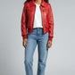 Scarlett Stitch women's red faux leather bomber jacket with ribbed collar, cuffs, and hem. Features chest flap pockets.