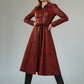 Scarlett Stitch red faux leather midi dress with distressed finish, pointed collar, button front, and tie belt.