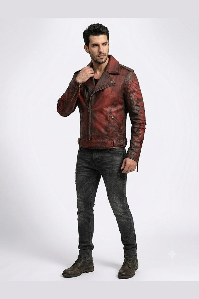 Scarlett Stitch Men's distressed red faux leather moto jacket with asymmetrical zip, notched lapel, and ribbed detailing.