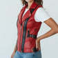Scarlett Stitch women's red faux leather moto vest with black accents and buckle details. Fitted silhouette.