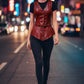 Scarlett Stitch deep red faux leather peplum vest with V-neck, antique brass buttons, and belt. Sleeveless.