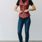 Scarlett Stitch deep red faux leather peplum vest with V-neck, button front, belt, and peplum hem.