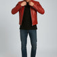 Scarlett Stitch red leather biker jacket with quilted shoulders and metal zippers worn by a man in jeans