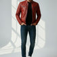 Scarlett Stitch men's red leather biker jacket with quilted shoulders and metal zippers worn by a male model.