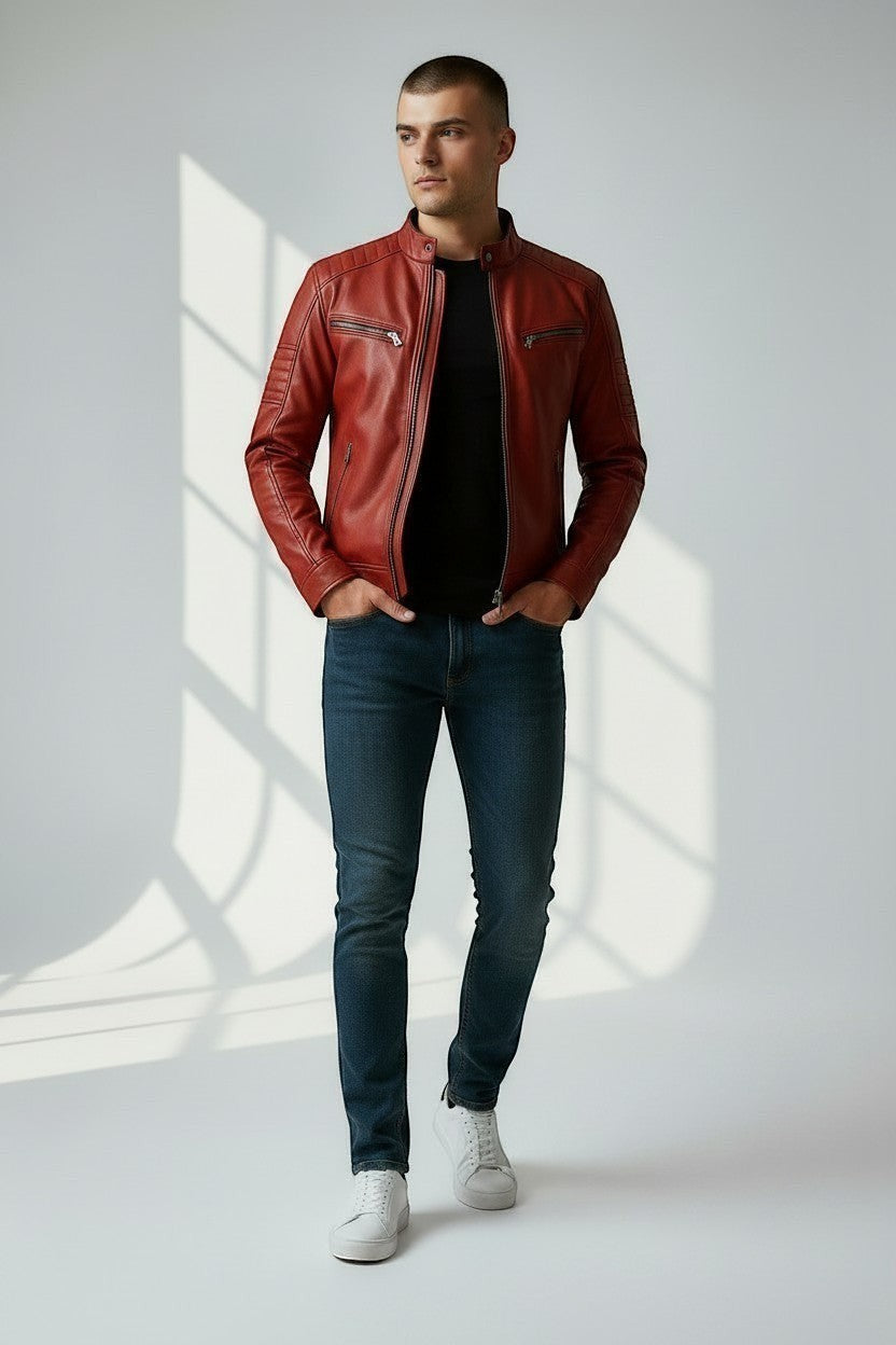 Scarlett Stitch men's red leather biker jacket with quilted shoulders and metal zippers worn by a male model.