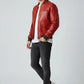 Scarlett Stitch men's red leather bomber jacket with ribbed collar, cuffs, and zippered pockets.