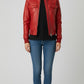 Scarlett Stitch red leather bomber jacket with zippered front, chest pockets, and sleeve pocket. Ribbed cuffs, collar, and hem.