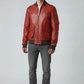 Scarlett Stitch men's red leather bomber jacket with ribbed collar, cuffs, and hem. Features zippered chest pockets and buttoned waist pockets.