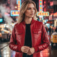 Scarlett Stitch red leather bomber jacket with zippered front, chest pockets, and sleeve pocket. Ribbed cuffs, collar, and hem.