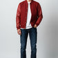Scarlett Stitch deep red wool-blend varsity bomber jacket with matching red leather sleeves and snap-button front.