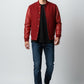 Scarlett Stitch deep red wool-blend varsity bomber jacket with matching red leather sleeves, snap-button front, and ribbed trim.