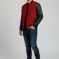 Scarlett Stitch red wool blend varsity bomber jacket with black faux leather sleeves and ribbed trim.