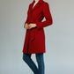 Scarlett Stitch red wool-blend belted coat with notched lapel and buckle detail.