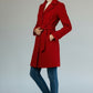 Scarlett Stitch red wool-blend belted coat with notched lapel and buckle detail. Single-breasted, two-button front.