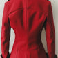Scarlett Stitch red wool blend double-breasted peacoat with notched lapel, epaulets, and cuffed sleeves.