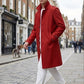 Scarlett Stitch men's red wool-blend military-style overcoat with button-down front and epaulets.