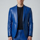Model wearing a royal blue Scarlett Stitch faux leather blazer with notch lapels and two-button closure.