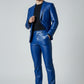 Man wearing a royal blue Scarlett Stitch faux leather tailored suit jacket with notch lapels and two-button closure.