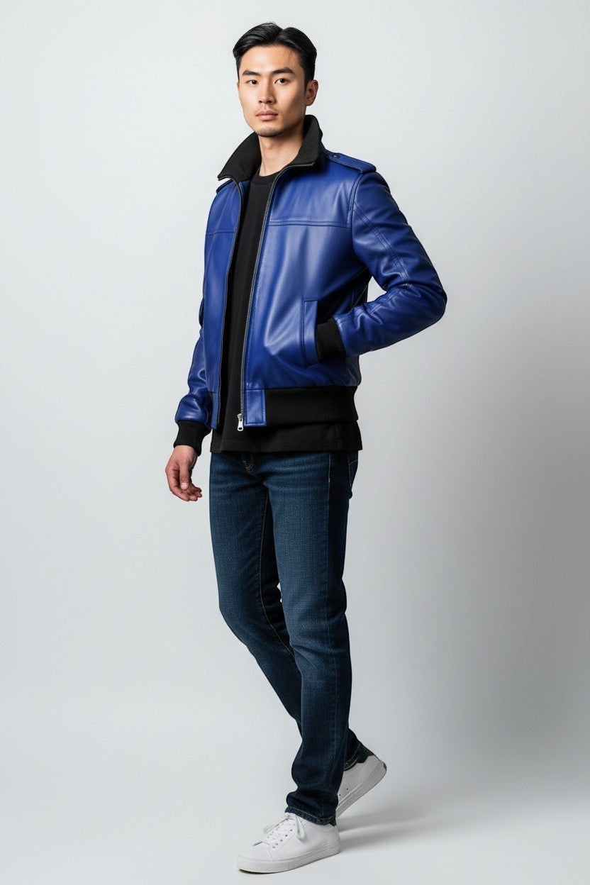 Scarlett Stitch royal blue leather bomber jacket with black ribbed collar, cuffs, and hem. Men's style.